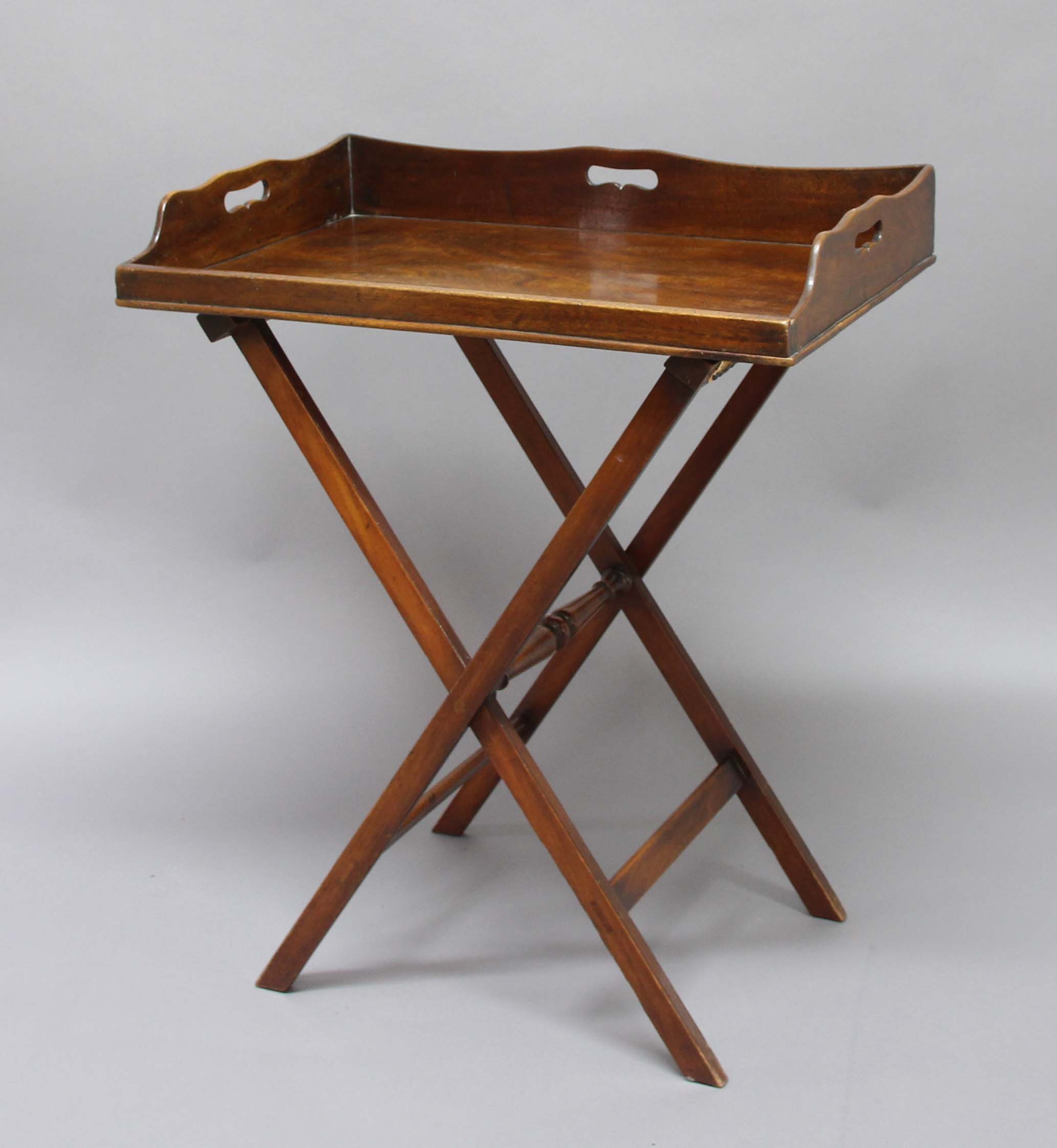 MAHOGANY BUTLER'S TRAY AND STAND, mid 19th century, the galleried tray