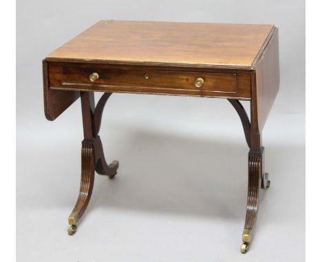 EDWARDIAN MAHOGANY SOFA TABLE, by Edwards and Roberts, the top crossbanded with rosewood and line inlaid above one true and o