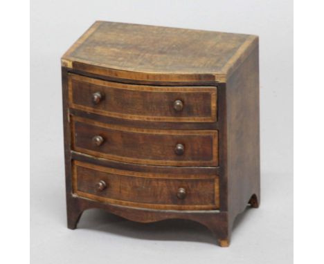 MINIATURE GEORGE III STYLE BOW FRONTED CHEST OF DRAWERS, later 19th century, with crossbanded top and drawer fronts, height 1