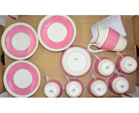 19th century ceramic part tea set to include six cups and saucers, cream and sugar bowl. White ground with gold banding and r