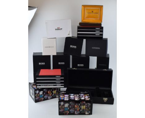 A collection of watch boxes by manufactures Hugo Boss, Tissot and DKNY. (Qty)  