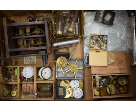 A mixed collection of clock and watch spare parts to include movements, clock key, tools and various similar items. (Qty)  A 