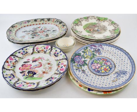 A collection of Masons Ironstone pottery to include a pair of platters, Asiatic Pheasant plates, Empress plates, a bible patt