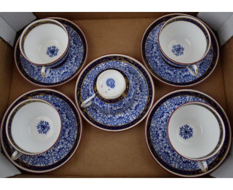 An early set of Royal Worcester cups and saucers in the Royal Lilly pattern, 5 cups and 5 saucers (10).  In good condition wi