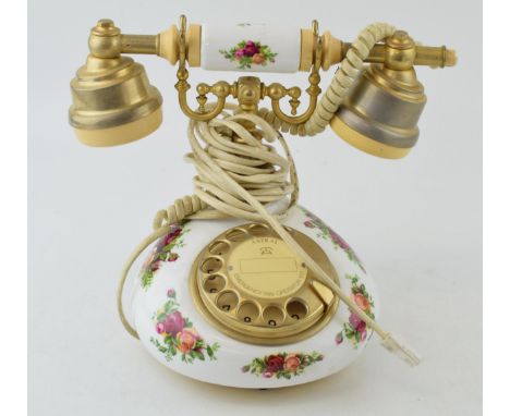 Royal Albert 'Old Country Roses' antique style rotary dial telephone made by Astral Telecoms England. Height 20cm.  In good o