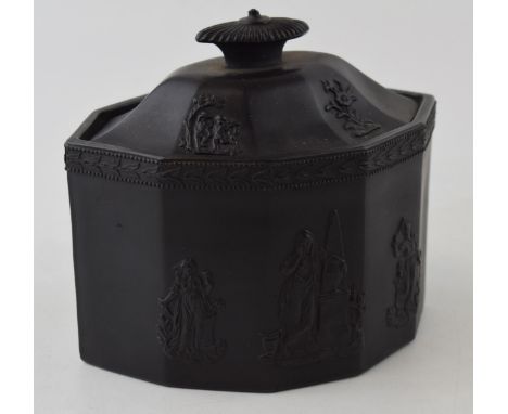 Early 19th century black basalt sucrier with floral springs and traditional scenes, shaped decahedron, 14.5cm wide, incised m