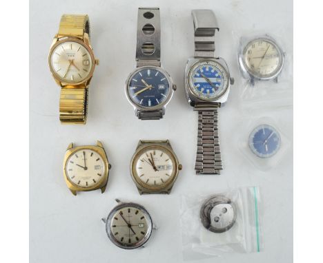 A collection of vintage gentlemen's Timex wristwatches, to include complete watches and a movement. (9)  Some examples workin