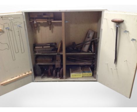 A painted pine tool cupboard, width 75cm, containing assorted joinery tools. 