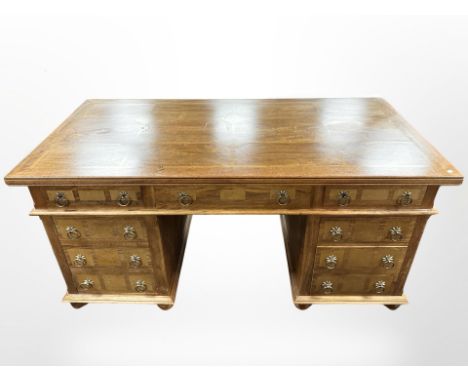 A Barker & Stonehouse flagstone twin-pedestal desk, 165cm wide x 80cm deep x 80cm high.