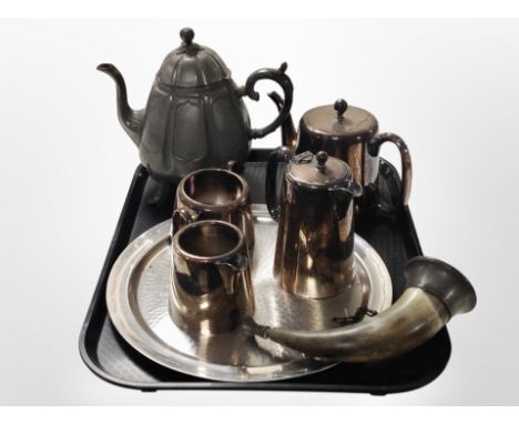 A stainless steel tea service and tray, together with a pewter teapot and a pewter-mounted horn.