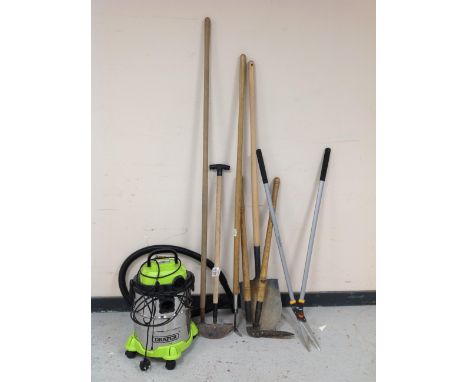 A Draper vacuum cleaner and a quantity of garden tools.