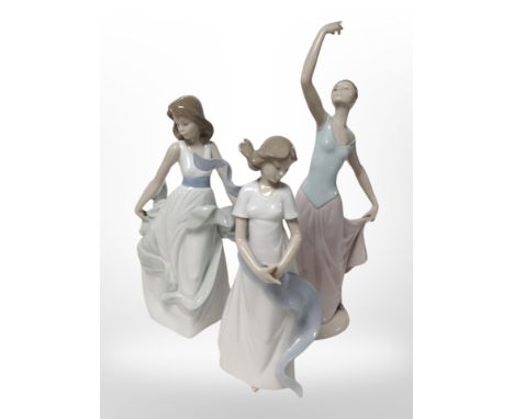 Three Nao figures of ladies, tallest 34cm.