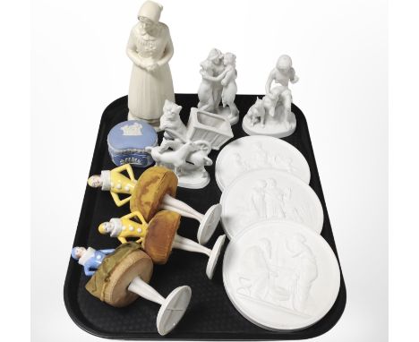 A group of Danish bisque porcelain figures including 'The Three Graces', together with further porcelain wall plaques, Wedgwo