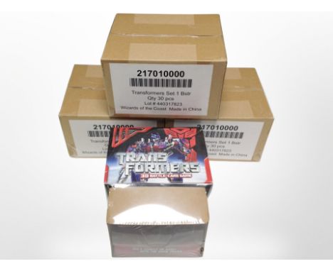 Four Transformers 3D Battle Card games, sealed, each with a related Transformers model.
