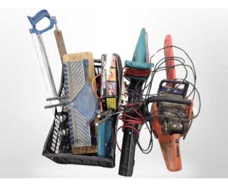 A crate containing hand tools, soldering gun, Black & Decker jigsaw, together with a Bosch electric hedge trimmer and a Dolma