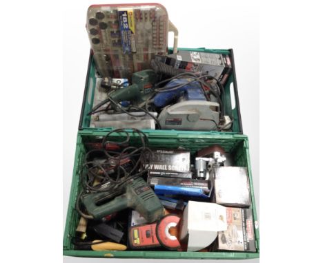 Two crates containing assorted power tools, LED magnifying glasses, rotary tool accessory set, etc.