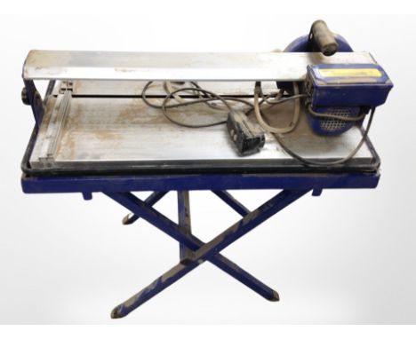 A 600 Watt bridge saw tile cutter.