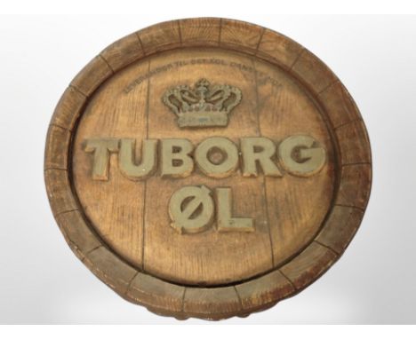 A ceramic Tuborg circular wall plaque, diameter 39cm.