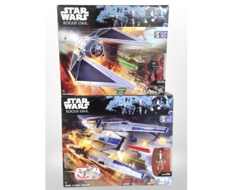 Two Hasbro Disney Star Wars Rogue One figures, Tie Striker and Rebel U-Wing Fighter, boxed.