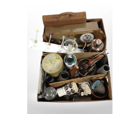 Two boxes containing Hermle wall clock, Scandinavian ceramics, lamp base, leather briefcase, etc.