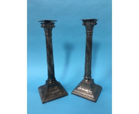 A pair of silver plated Corinthian column candlesticks, 33cm height 