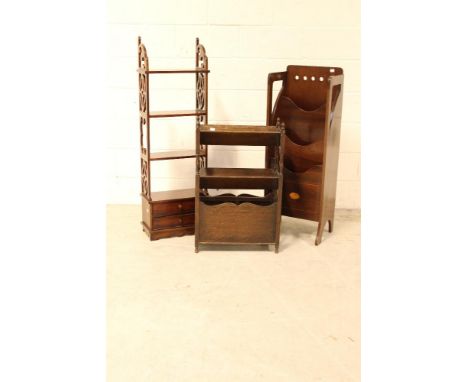 An Edwardian line inlaid Arts and Crafts style mahogany journal stand with fan paterae, a small 1930s oak book trough and mag