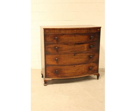 A George III mahogany bow-front chest of four drawers on ogee bracket feet, height 110cm. CONDITION REPORT Some fine cracks t