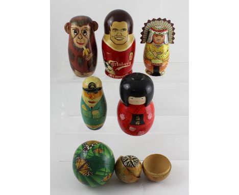 A small collection of novelty Russian style dolls to include a Liverpool FC Michael Owen example, height 17cm, a Japanese Gei