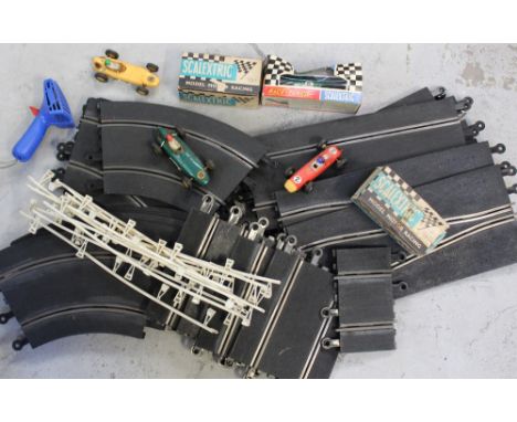 A collection of vintage Scalextric to include a figure of eight track, controllers, a boxed C7 Rally Mini Cooper, a boxed C13