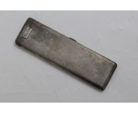 An unusual George V hallmarked silver Art Deco style double-length and half-width cigarette case, engine-turned finish with g