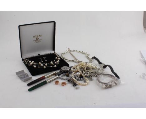 A quantity of costume jewellery to include three two strand coloured faux pearl necklace, vintage earrings, silver hoop earri