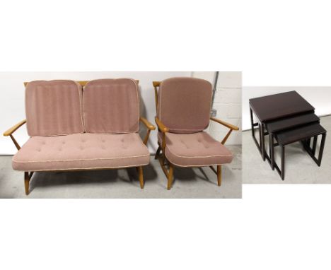 An Ercol two piece cottage suite in light beech, width of sofa 130cm, and a nest of three dark stained mahogany tables (3).