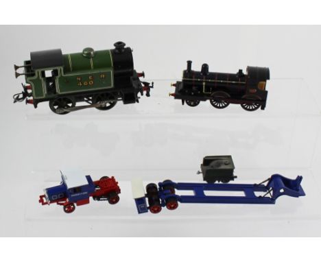 An LMR 460steam engine, a Matchbox 'Models of Yesteryear' class 2-4-0 locomotive and a Pickfords truck.