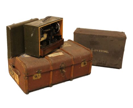 A painted canvas and wooden-strapped steamer trunk with P&amp;O and British India labels, width 86cm, a smaller leather examp
