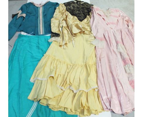 A collection of vintage costumes, dresses and vintage clothing.