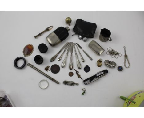 Seven matching and non matching silver handled Edwardian manicure items, a white metal box containing miniature nail files, a