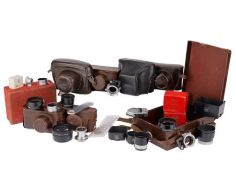 to include a range of ERC, a Leitz Elmar 5cm f/3.5 lens, with focussing tab cut away, a good selection of lens hoods, some cl