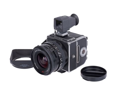 2001-2006, chrome, serial no. 1ASP10182, with Carl Zeiss CFi Biogon T* f/4.5 38mm lens, black, serial no. 8907703, body, VG-E