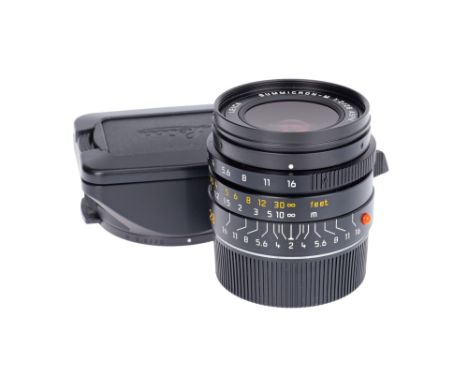 black, serial no. 3928730, body, E, elements, VG-E, complete with maker's lens hood and caps