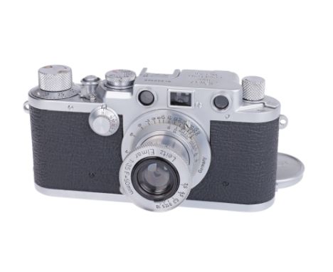 1951/52, chrome, serial no. 609968, with Leitz Elmar f/3.5 50mm lens, chrome, serial no. 170503, body, VG-E, shutter working,