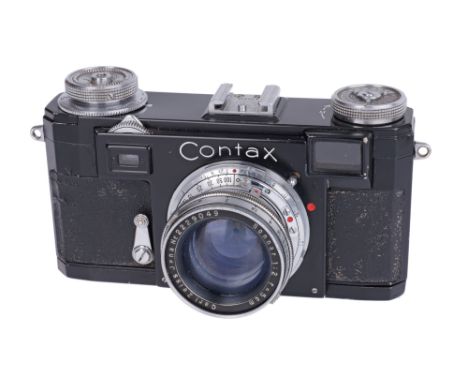 1950-54, black*, serial no. A48335, with Carl Zeiss Jena Sonnar f/2 50mm lens, chrome, serial no. 2229049, body, F-G, shutter