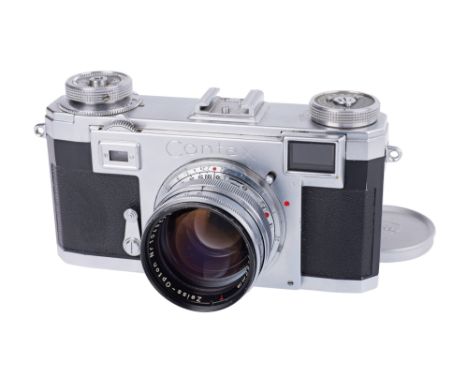 1950-54, chrome, serial no. A48303, with Zeiss-Opton Sonnar T f/1.5 50mm lens, chrome, serial no. 1049672, body, VG, shutter 