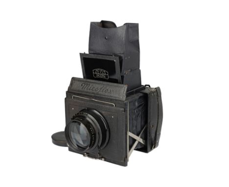 1929-36, black, serial no. P15212, 9 x 12cm format, with a Carl Zeiss Jena Tessar f/2.7 16.5cm lens, serial no.981200, body, 
