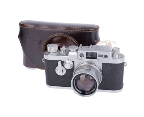1957, chrome, serial no. 890461, with Leitz Summicron f/2 50mm lens, chrome, serial no. 1479409, body, VG, shutter working, h