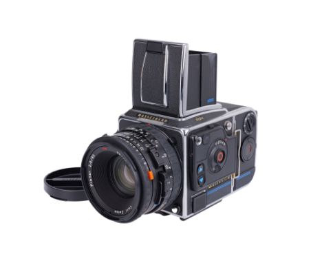 2000, black/chrome, serial no. 18SS10877, with Carl Zeiss Planar T* CFE f/2.8 80mm lens, black, serial no. 8875478, body, VG-