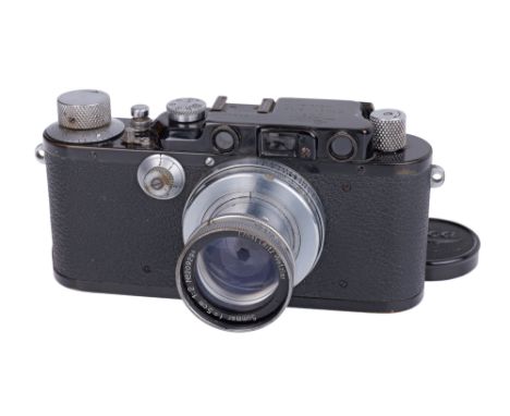 1934, black/chrome, serial no. 126803*, with Leitz Summar f/2 50mm lens, chrome, serial no. 209294, body, VG, shutter working