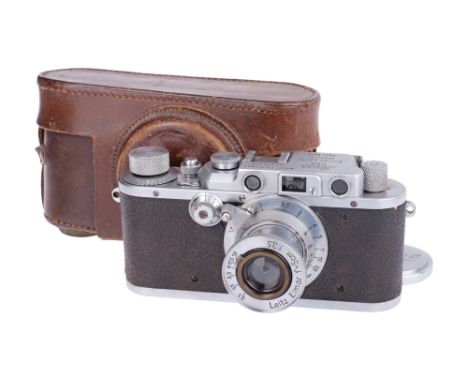 1938, chrome, serial no. 299276, with Leitz Elmar f/3.5 50mm lens, chrome, serial no. 125191, body, G-VG, shutter working but