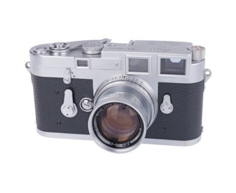 1957, chrome, serial no. 857823, with Leitz Summicron f/2 50mm lens, chrome, serial no. 1233415, body, G, shutter working, le