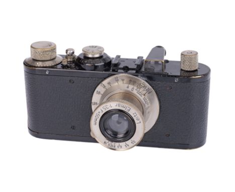 1934, black/nickel, serial no. 123288, with Leitz Elmar f/3.5 50mm lens, nickel, body, F-G, shutter working, chip to viewfind