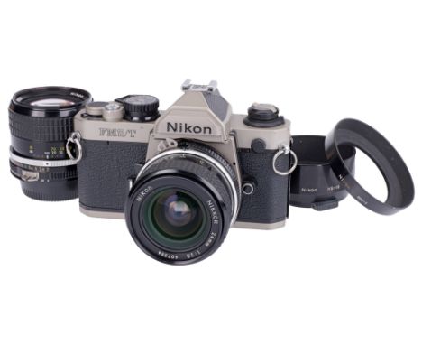 1994-97, titanium, serial no. T9010240, with Nikon Ai Nikkor f/2.8 24mm lens, black, serial no. 607334, body, VG, shutter wor
